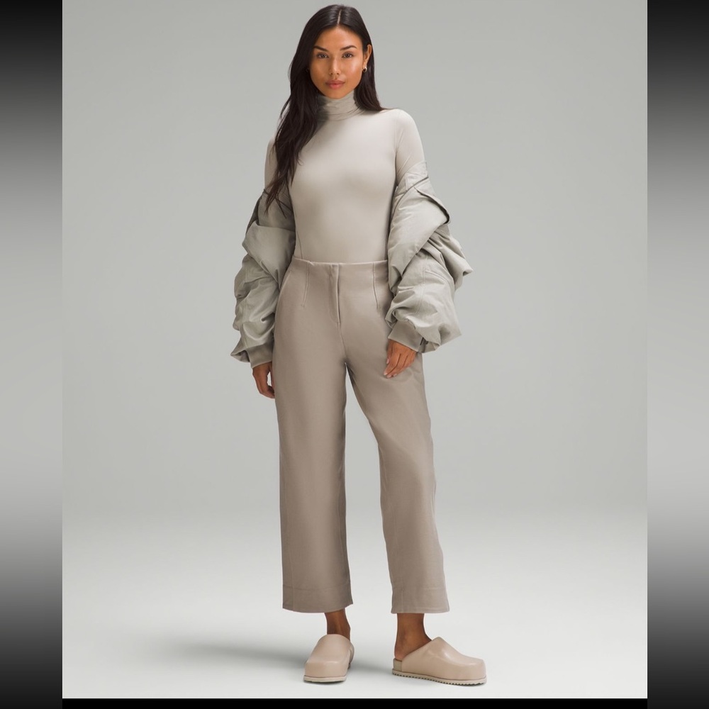 Lululemon wundermost ultra soft nulu turtle neck bodysuit 
-river stone color